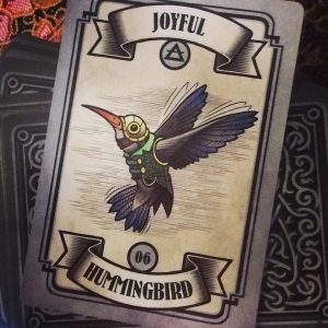 Joyful - Hummingbird card indicates joy and a lighter feeling in the heart is coming after ascension heart awakening